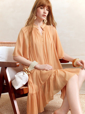 Step into sunshine with this Elegant Orange Chiffon Mini Dress, designed to bring a playful fairycore vibe to your summer wardrobe. Light and airy, its ruffled layers dance with every breeze, making it perfect for twirling through warm days and starry nights. Embrace effortless charm and let your style bloom in this vibrant, flirty dress.