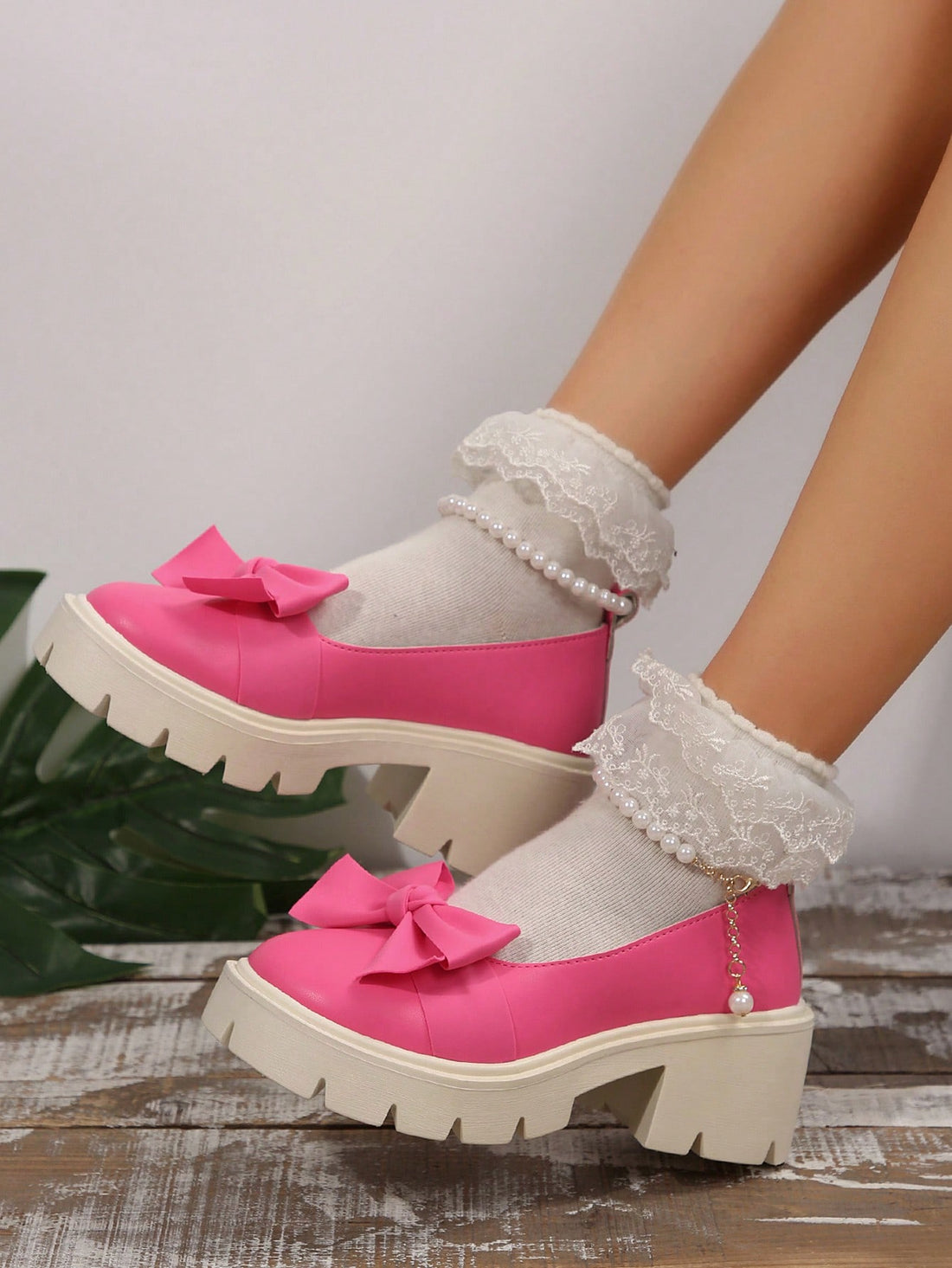 Step up your shoe game with our Elegant Pearl Bow Mary Jane Wedge Flats! These slip-on shoes are not only stylish, but also incredibly comfortable for any occasion. The pearl bow adds a touch of elegance to your outfit, making you stand out from the crowd. Perfect for fashion-forward individuals who don't take themselves too seriously!