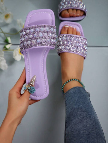These Elegant Pearl Rhinestone Flat Sandals for Women feature a stunning square toe design and shimmering embellishments to ensure that every shoe adds a touch of class.