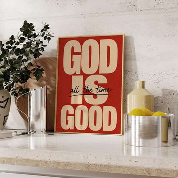 Front view of God Is Good canvas wall art with red and cream lettering