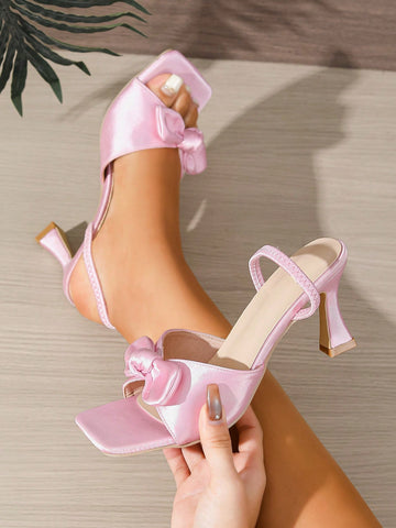 Step into sophistication with these stunning pink high heels, where timeless elegance meets modern charm. The delicate bowknot detail adds a playful touch of femininity, while the sleek silhouette keeps things effortlessly chic. Designed for the woman who refuses to compromise between style and comfort, these heels transition seamlessly from office to evening events. Whether you're dressing up for a special night out or elevating your everyday look, this versatile pair delivers that perfect balance of glamo