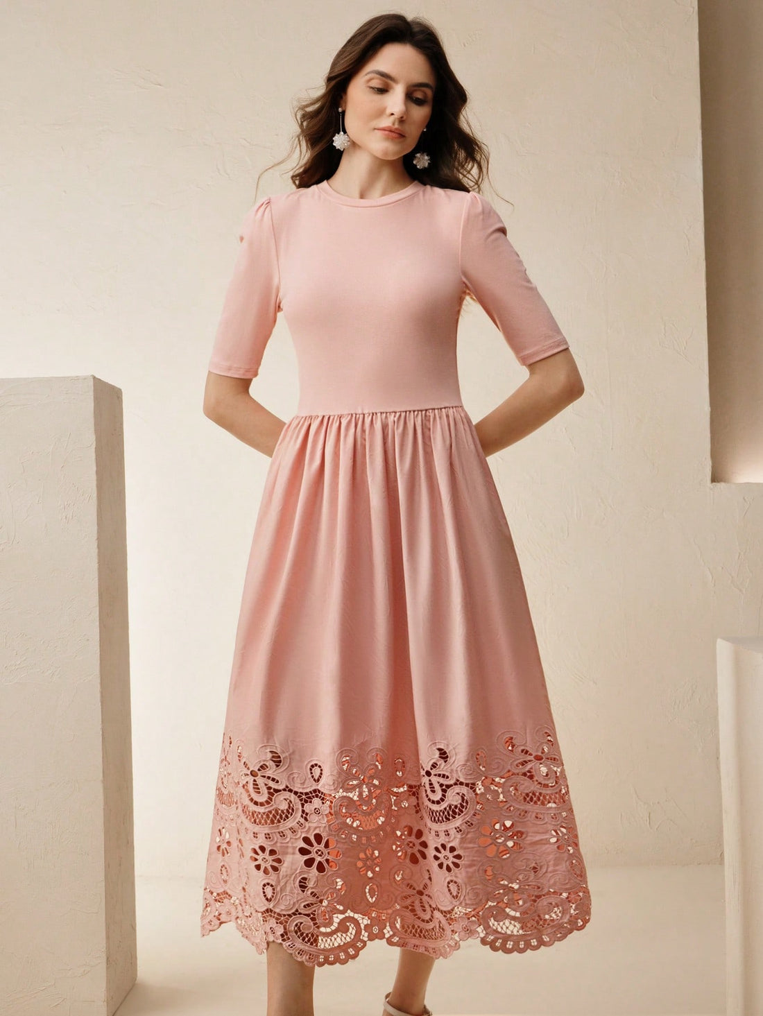 Step into charm with this Elegant Pink Midi Dress, featuring flirty half sleeves and a delicate floral lace hem that dances with every step. Perfect for twirling through garden parties or adding a pop of playful elegance to your day, this dress blends comfort and style effortlessly. Embrace your feminine side with a touch of whimsy!