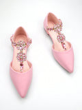 Step into elegance with these stunning pink rhinestone flat shoes, designed for those who refuse to compromise on style. Featuring a delicate ankle strap and sparkling rhinestone chain detailing, these handmade flats offer the perfect blend of sophistication and comfort. The pointed toe silhouette and buckle closure create a refined look ideal for both everyday wear and special occasions. Crafted with premium PU leather upper and lining, paired with a durable TPR outsole, these shoes deliver lasting quality