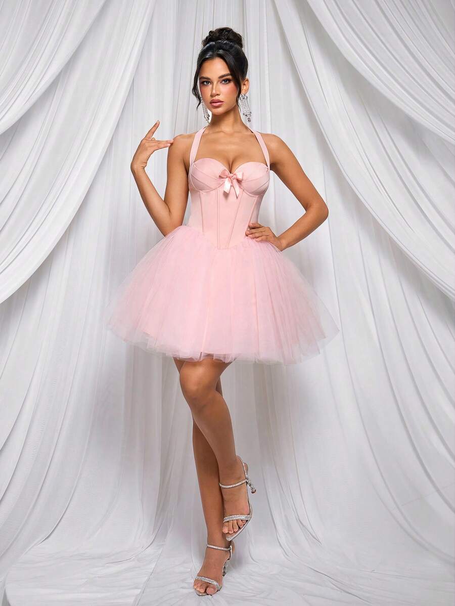 Elevate your event wardrobe with this stunning pink satin halter neck dress. The luxurious satin fabric drapes beautifully, creating an elegant silhouette that turns heads at music festivals, parties, and graduation celebrations. The halter neckline offers a flattering, sophisticated look while the flowing design ensures comfort throughout the night. Whether you're dancing under the stars or posing for photos, this dress delivers timeless style and confidence.
