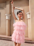 Be the belle of the ball in our Elegant Pink Tulle Ruffle A-Line Dress. With delicate spaghetti straps and a flattering square neckline, this dress is perfect for dancing the night away. The soft tulle material and feminine ruffle details add a touch of whimsy. Who says you can't be elegant and playful at the same time?!
