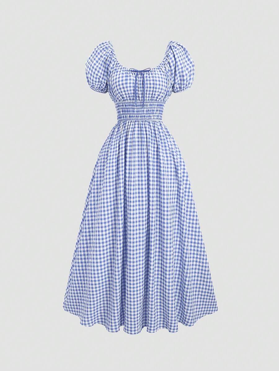 Step out in style with this playful plaid mini dress featuring charming puff sleeves and a flattering cinched waist. The tie front adds a flirty touch, making it perfect for sunny days or casual nights out. Lightweight and fun, it’s your go-to for effortless chic.