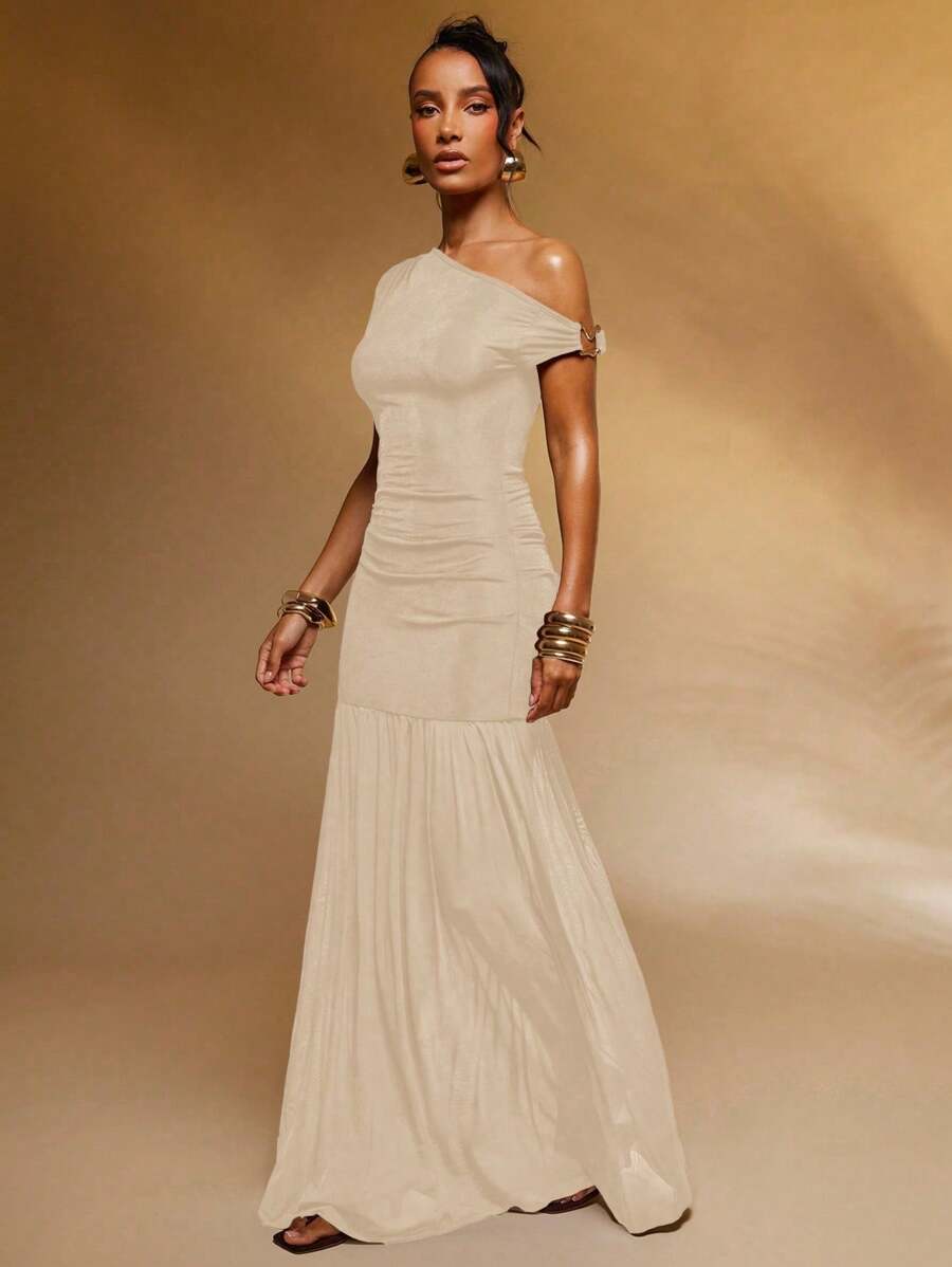 Turn heads with this Elegant Pleated Asymmetric Neck Dress, designed to add a playful twist to your wardrobe. The unique pleated detail and asymmetric neckline create a chic silhouette, while the solid color ensures versatile style for any occasion. Perfect for those who love to make a subtle yet stylish statement.