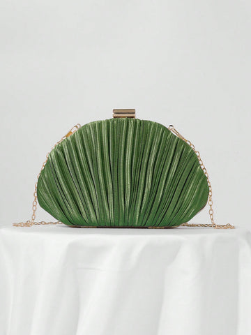 Our Elegant Pleated Satin Evening Clutch is the perfect accessory for prom and formal events. Made with high-quality satin and featuring a chic pleated design, this clutch exudes elegance and sophistication. The included chain strap allows for easy hands-free carrying, making it both stylish and functional. Enhance your outfit with this must-have accessory.