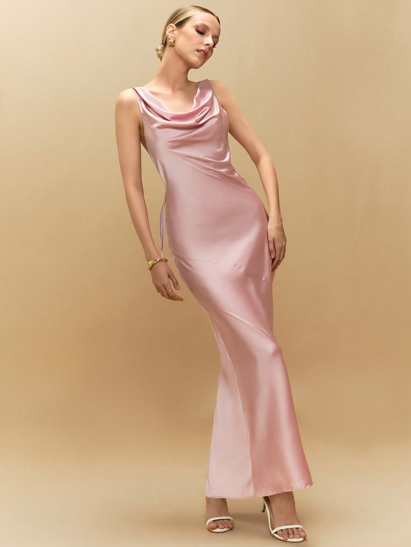 Unleash your playful and elegant side with this must-have dress! The plunging neckline and backless design add just the right amount of allure, while the sophisticated cut and design make it perfect for any occasion. A versatile and stylish addition to your wardrobe!