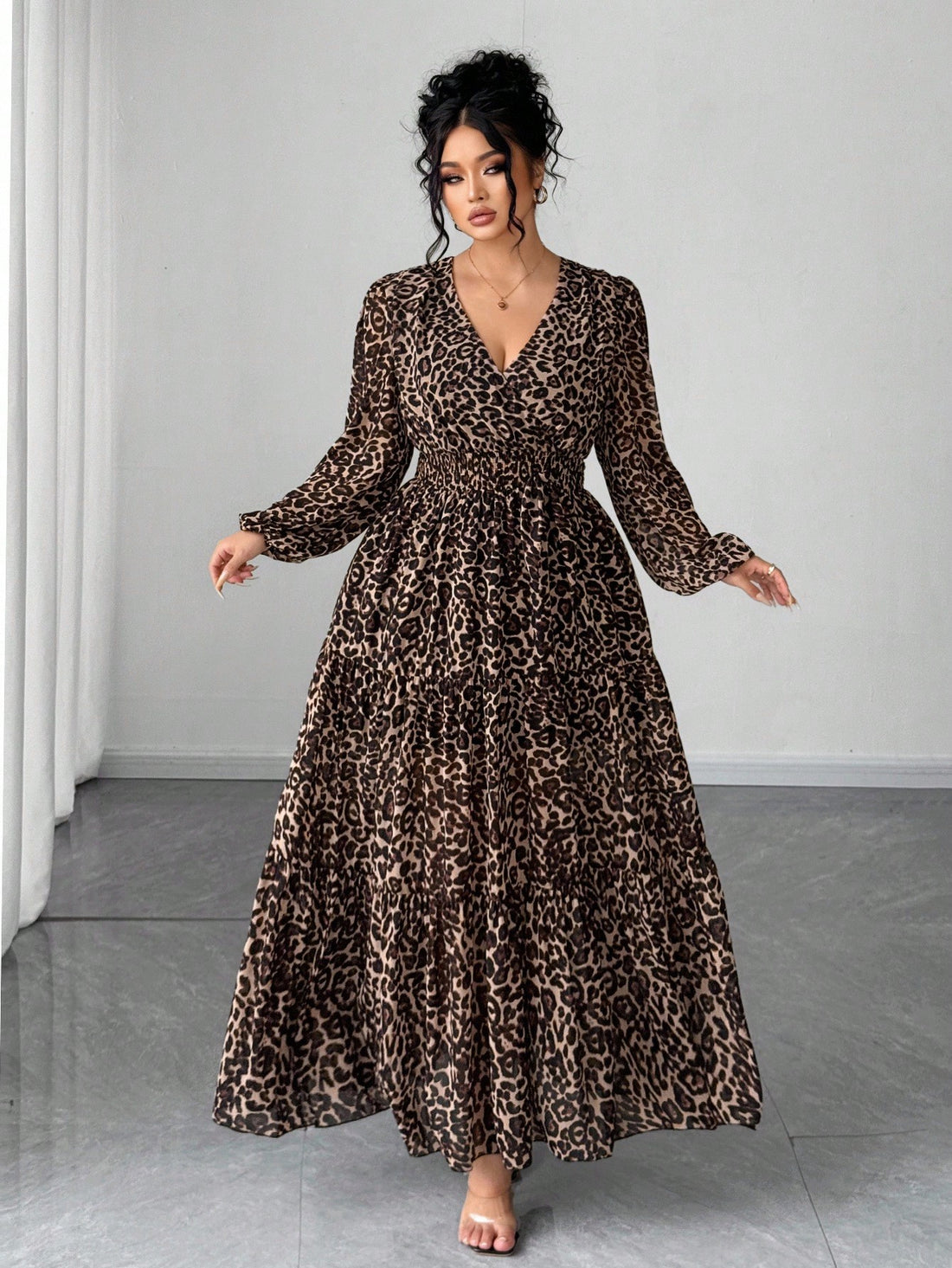 Step out in style with this playful plus-size chiffon dress featuring a chic leopard print. The flattering V-neck and long sleeves add a touch of elegance, making it perfect for dates and outings. Lightweight and flowy, it feels as good as it looks, helping you embrace your wild side with confidence and charm.