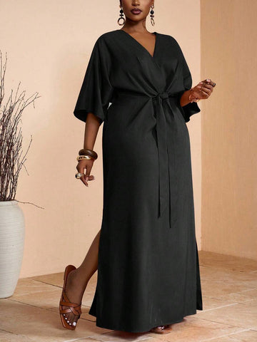 Step into effortless charm with this playful plus-size khaki maxi dress. The flattering V-neck frames your smile, while the waist tie lets you show off your curves in style. Perfect for breezy spring and sunny summer days, its slit hem adds a flirty touch that keeps you cool and confident all season long. Whether brunching with friends or chasing sunsets, this dress is your new go-to for easy elegance with a fun twist.