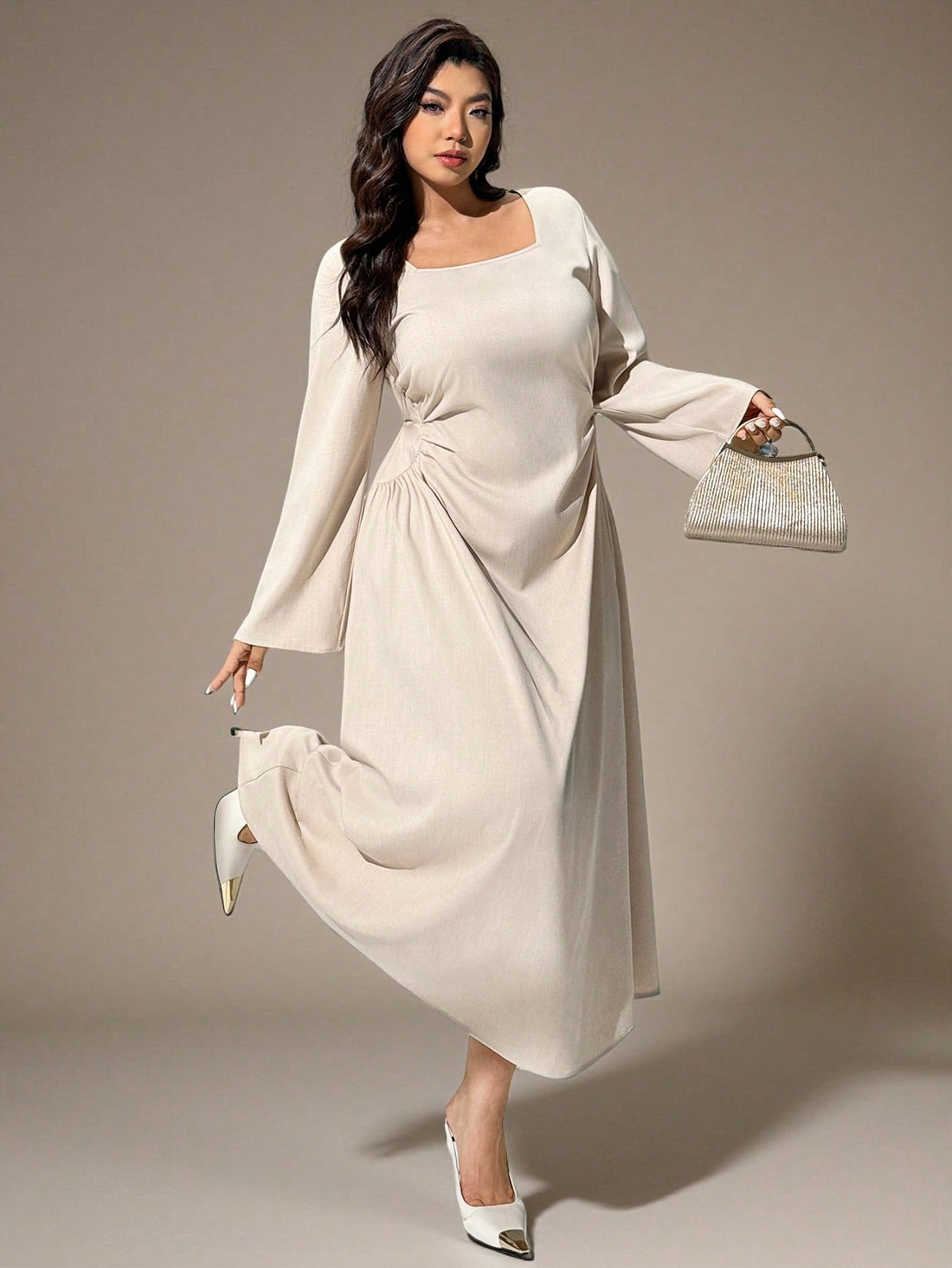 Elevate your wardrobe with this stunning plus-size A-line dress that effortlessly transitions from boardroom to brunch! The flattering square neckline and long sleeves provide timeless elegance, while strategic ruching adds dimension and movement. Whether you're dressing up for a special event or keeping it casual, this versatile piece celebrates your curves with confidence and style. Perfect for anyone who refuses to compromise on sophistication or comfort.