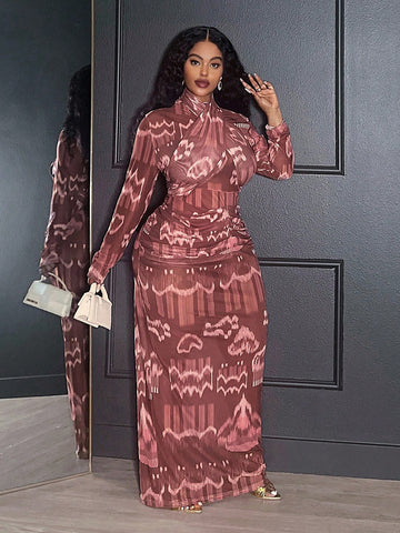 Turn heads effortlessly with this Elegant Plus-Size Maxi Dress, designed to celebrate your curves with a flattering fitted silhouette. The long sleeves and V-neck add a touch of sophistication, while the abstract mesh print brings a playful, modern edge. Perfectly suited for date nights, parties, or graduations, this dress ensures you feel confident and radiant wherever you go. Step out in style and make every special occasion unforgettable!