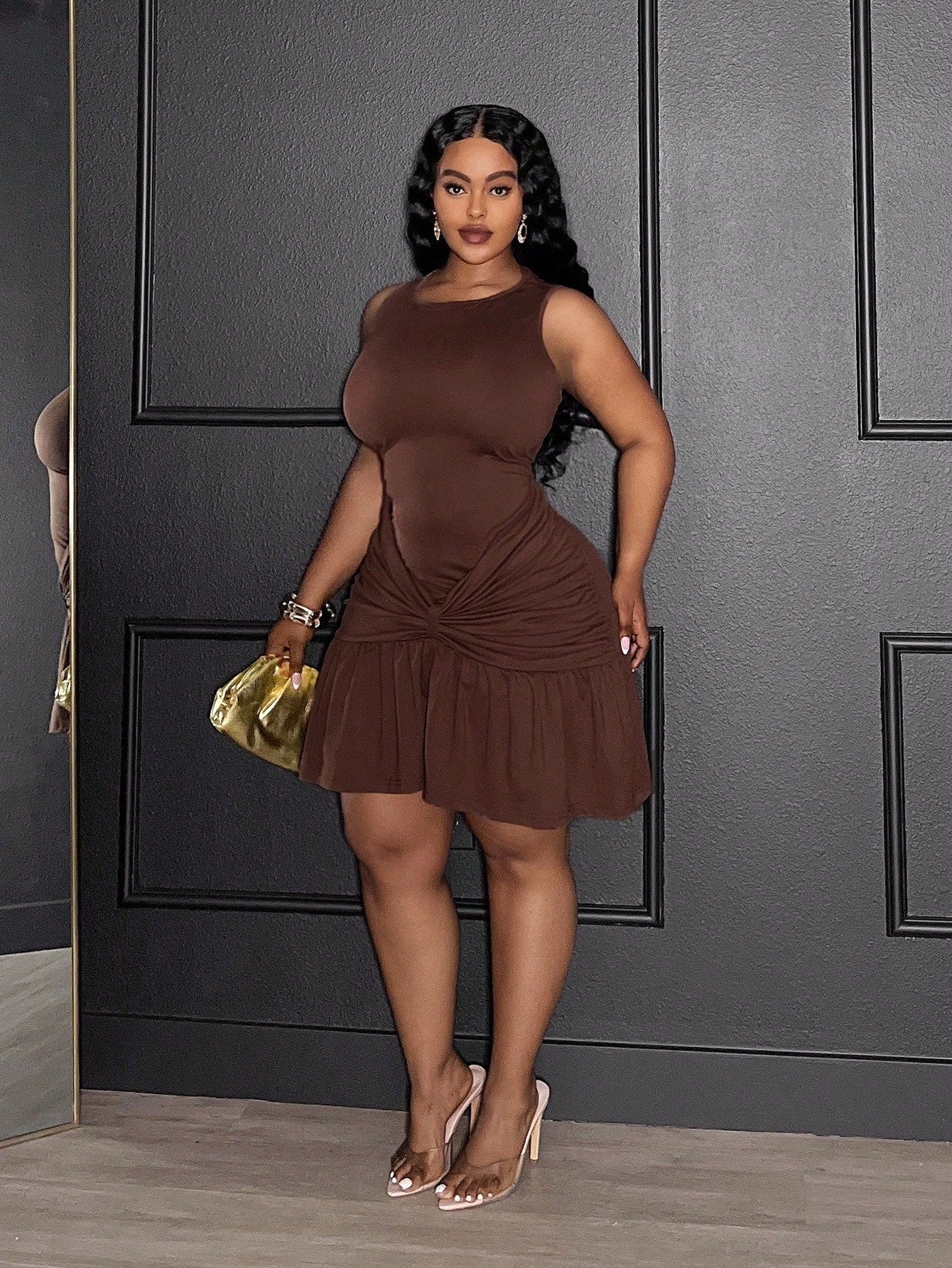 Step out in style with this playful yet elegant plus-size mini dress, perfect for spring and summer date nights. The solid brown hue complements any skin tone, while the flirty ruffle hem adds movement and charm. A ruched waist flatters your figure, offering a touch of sass with every step. This dress combines comfort and confidence, making your special evenings unforgettable.