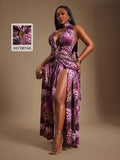 Turn heads this season in our Elegant Plus-Size Purple Leopard Print Halter Dress. Designed with a bold high slit and a flattering halter neckline, it’s perfect for spring and summer events where style meets comfort. The vibrant purple leopard print adds a playful edge while embracing your curves with confidence. Whether it’s a garden party or a night out, this dress brings a fun, fierce vibe to your wardrobe.