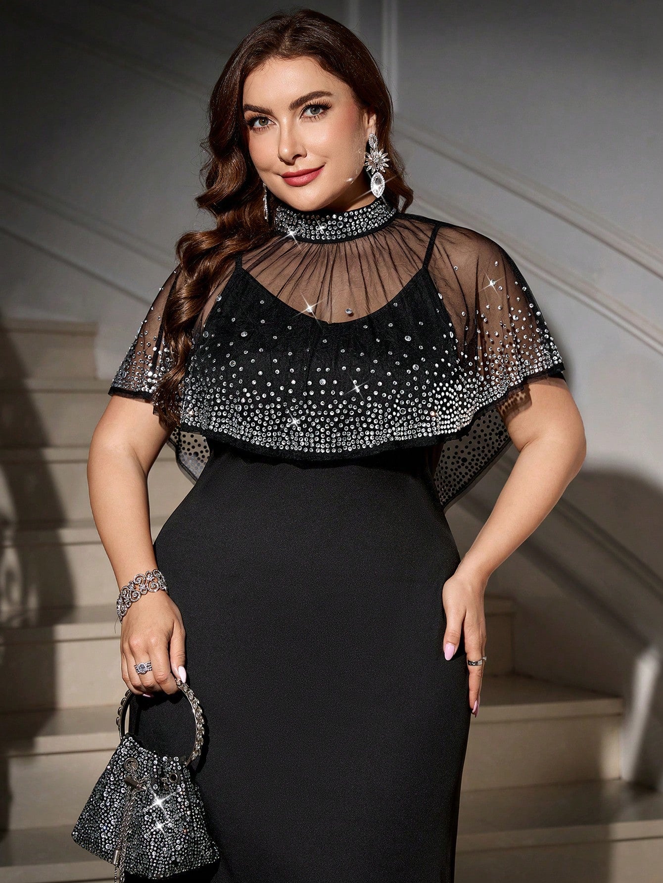 Make a statement this season with our stunning plus-size two-piece outfit, designed to turn heads at every autumn celebration. The luxurious rhinestone shawl adds just the right amount of sparkle and sophistication, while the perfectly coordinated pieces flatter your curves beautifully. Whether you're heading to a party, gathering, or special event, this ensemble delivers elegance with a fun, confident edge. Comfortable, chic, and absolutely show-stopping—because you deserve to feel fabulous!