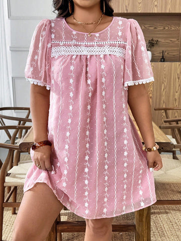 Twirl into the spotlight with this charming plus-size mini dress that celebrates your curves with style! Featuring delicate embroidered details and a flirty frilly trim, this short-sleeve beauty strikes the perfect balance between sophisticated and fun. The flattering cut ensures you'll feel confident and fabulous whether you're heading to brunch, a night out, or any occasion that calls for effortless elegance. Comfort meets fashion in this must-have piece that proves you can absolutely slay in something th