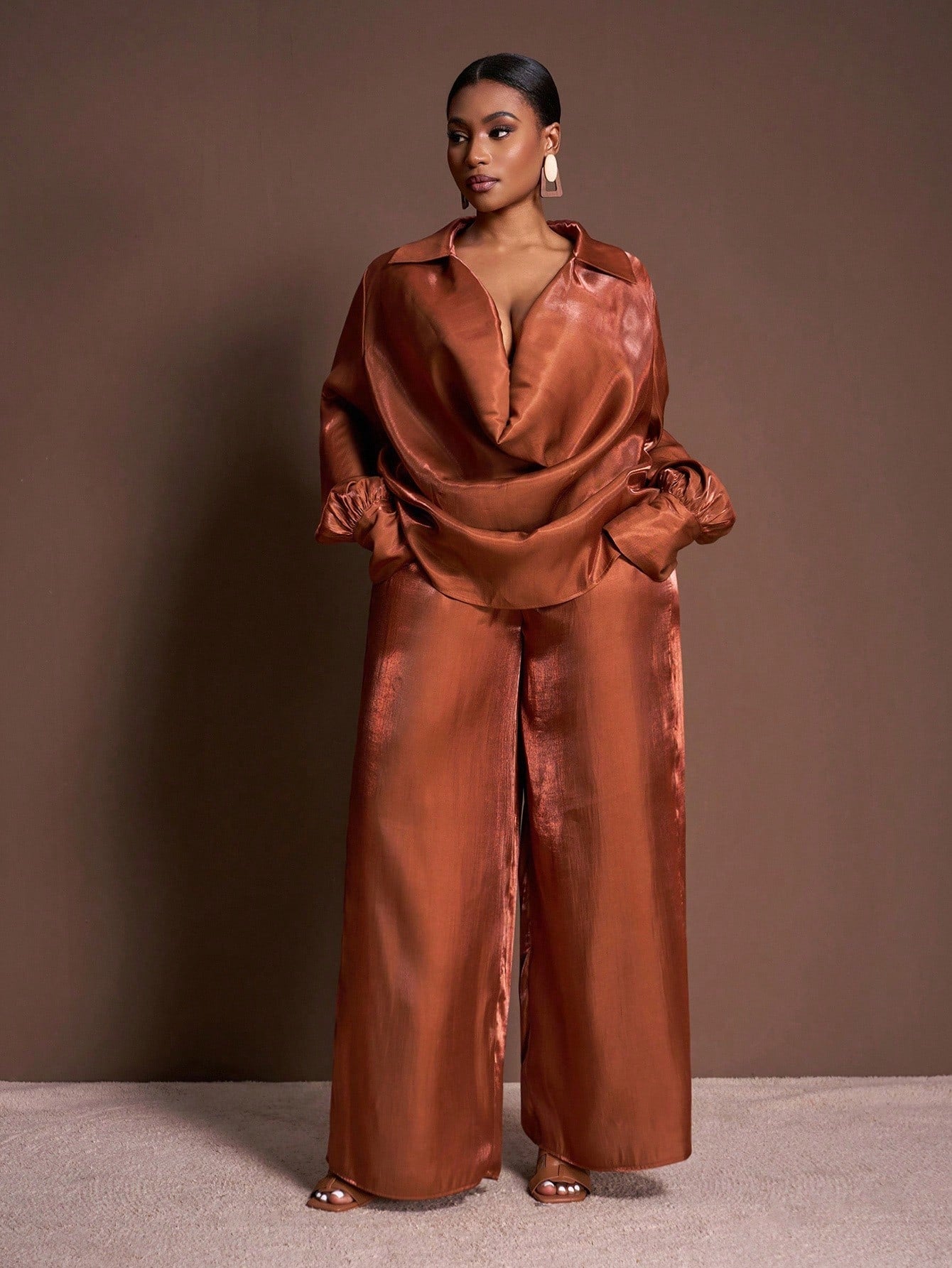 Elevate your spring wardrobe with this fabulous two-piece chiffon set designed for the modern, confident woman. The flowing long lantern sleeves add a touch of whimsy and elegance, while the wide-leg pants create a flattering silhouette that moves beautifully with you. Crafted from lightweight chiffon, this set is perfect for brunch dates, garden parties, or any occasion calling for effortless sophistication. Mix and match with your favorite accessories to create endless looks. Comfort meets style in this m