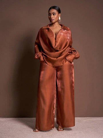 Elevate your spring wardrobe with this fabulous two-piece chiffon set designed for the modern, confident woman. The flowing long lantern sleeves add a touch of whimsy and elegance, while the wide-leg pants create a flattering silhouette that moves beautifully with you. Crafted from lightweight chiffon, this set is perfect for brunch dates, garden parties, or any occasion calling for effortless sophistication. Mix and match with your favorite accessories to create endless looks. Comfort meets style in this m