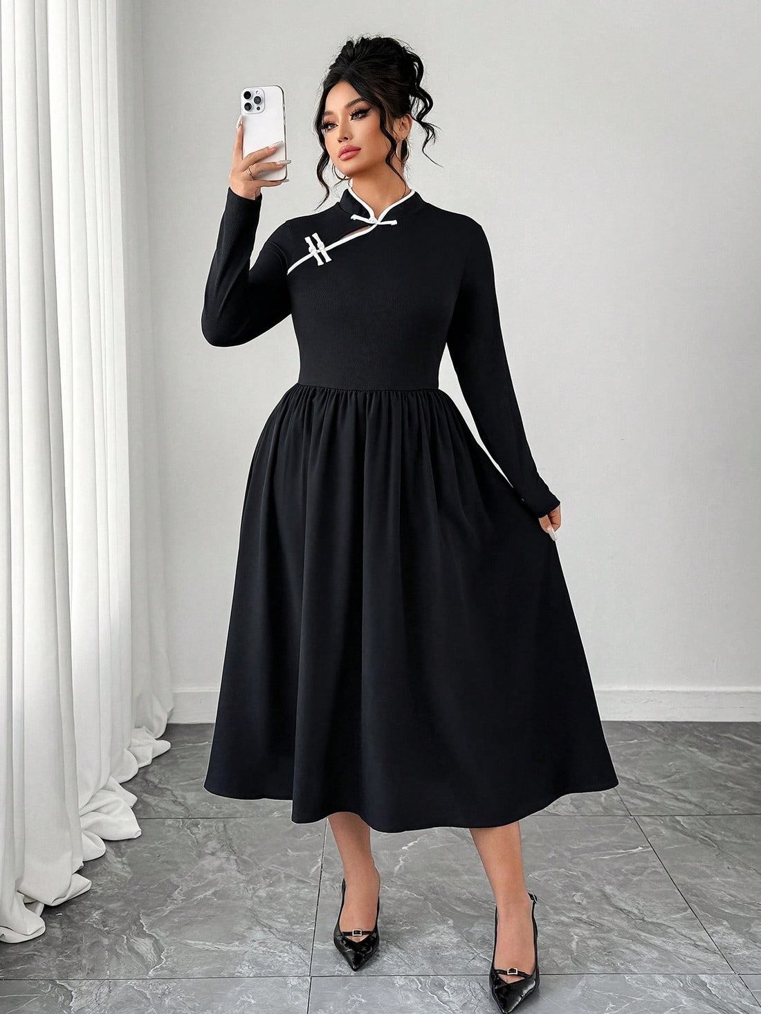 Embrace the season in style with this charming plus-size autumn dress that's ready for anything your day throws at you. The crisp button front adds a touch of sophistication, while the contrasting trim details frame your silhouette beautifully. Perfect for layering with your favorite cardigan or jacket, this versatile piece transitions seamlessly from casual coffee dates to weekend errands. The relaxed fit ensures all-day comfort without compromising on elegance. Whether you're dressing up or keeping it low