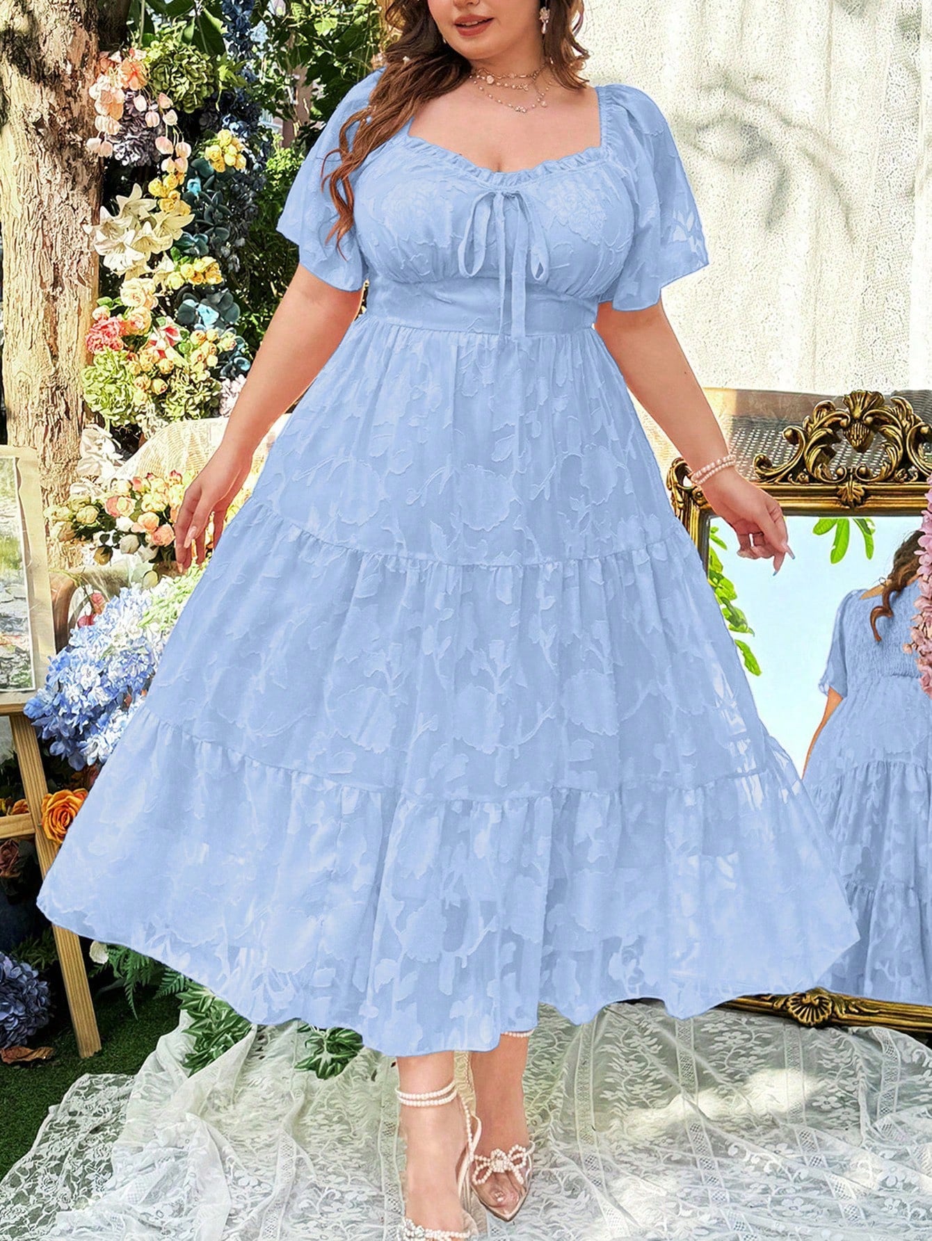 Get ready to rock the beach in style with our Elegant Plus Size Beach Ready A-Line Dress! With a flattering A-line silhouette, backless detail, and ruffle sleeves, this dress will have you looking and feeling your best. The round neck adds a touch of elegance to this playful and chic dress.