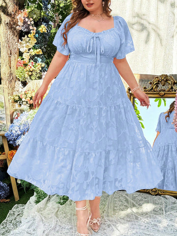 Get ready to rock the beach in style with our Elegant Plus Size Beach Ready A-Line Dress! With a flattering A-line silhouette, backless detail, and ruffle sleeves, this dress will have you looking and feeling your best. The round neck adds a touch of elegance to this playful and chic dress.