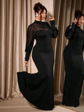 Make a statement this holiday season in this stunning black fitted dress designed for curves and celebrations. The sleek silhouette hugs you in all the right places, while delicate semi-sheer sleeves add an elegant touch of sophistication and movement. Perfect for Christmas parties, festive dinners, or any occasion calling for timeless glamour. Feel confident, comfortable, and absolutely fabulous in a dress that celebrates your style and beauty.