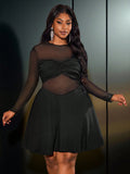 Celebrate your curves in style with this stunning black mesh patchwork dress designed for the modern woman. The strategic raglan sleeves create a flattering silhouette while the intricate mesh detailing adds an edgy-elegant touch. Perfect for nights out, special occasions, or whenever you want to feel absolutely fabulous. This plus-size beauty combines comfort with confidence, letting you move freely while turning heads. Embrace your shape and own the room in this show-stopping piece that proves fashion has