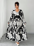 Bloom into elegance with this stunning plus-size dress that's equal parts romantic and refined. The classic black and white rose print brings timeless charm, while the long sleeves and cinched waist create a flattering silhouette that celebrates your curves. Perfect for date nights, special occasions, or whenever you want to feel absolutely fabulous. This dress proves that style has no size limit—slip it on and let your confidence blossom.