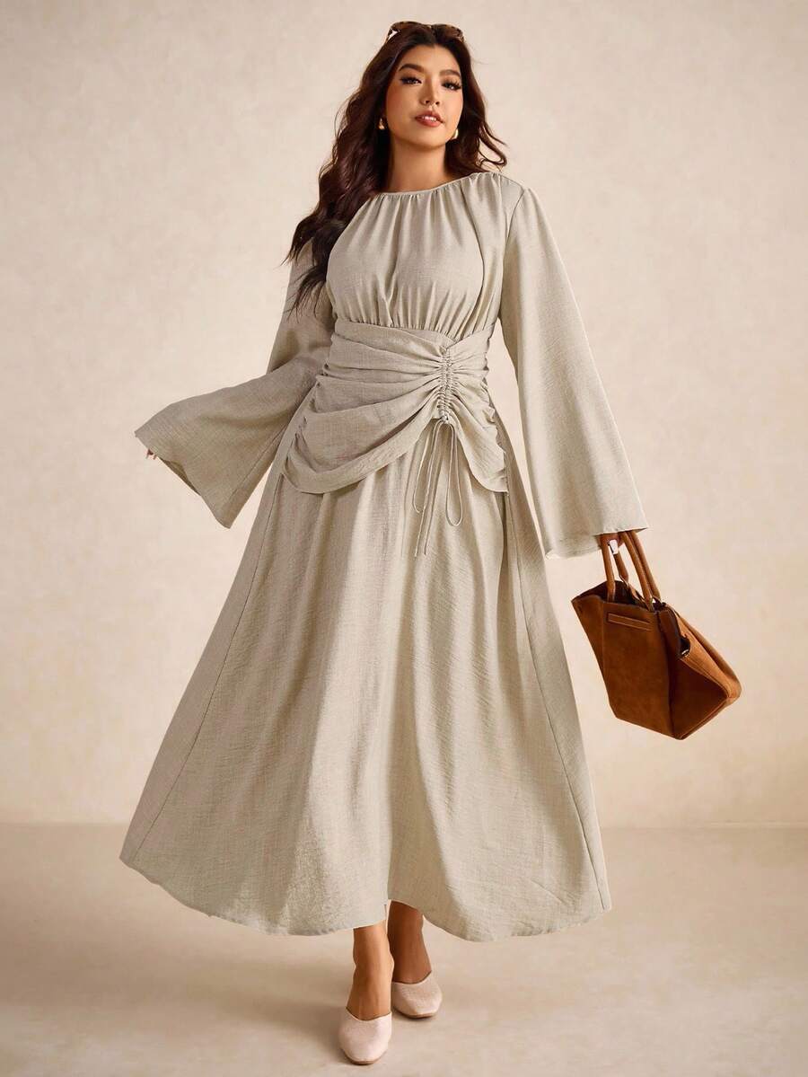 Slip into effortless sophistication with this stunning blue midi dress that celebrates your curves in all the right ways. The cinched waist creates a flattering silhouette while long sleeves add polish and versatility for any season. Perfect for casual outings or elevated everyday moments, this piece transitions seamlessly from brunch to dinner. The rich blue hue pairs beautifully with your favorite accessories, making it a wardrobe essential that works as hard as you do. Comfort meets style in this go-to d