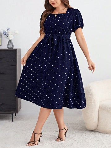 Step into summer with this playful plus size blue polka dot dress, featuring charming puff sleeves and a flattering belt to highlight your waist. Its light, breezy fabric keeps you cool and comfortable, while the classic polka dot pattern adds a fun, timeless touch to your wardrobe. Perfect for sunny days and casual outings, this dress effortlessly blends elegance with a spirited vibe.