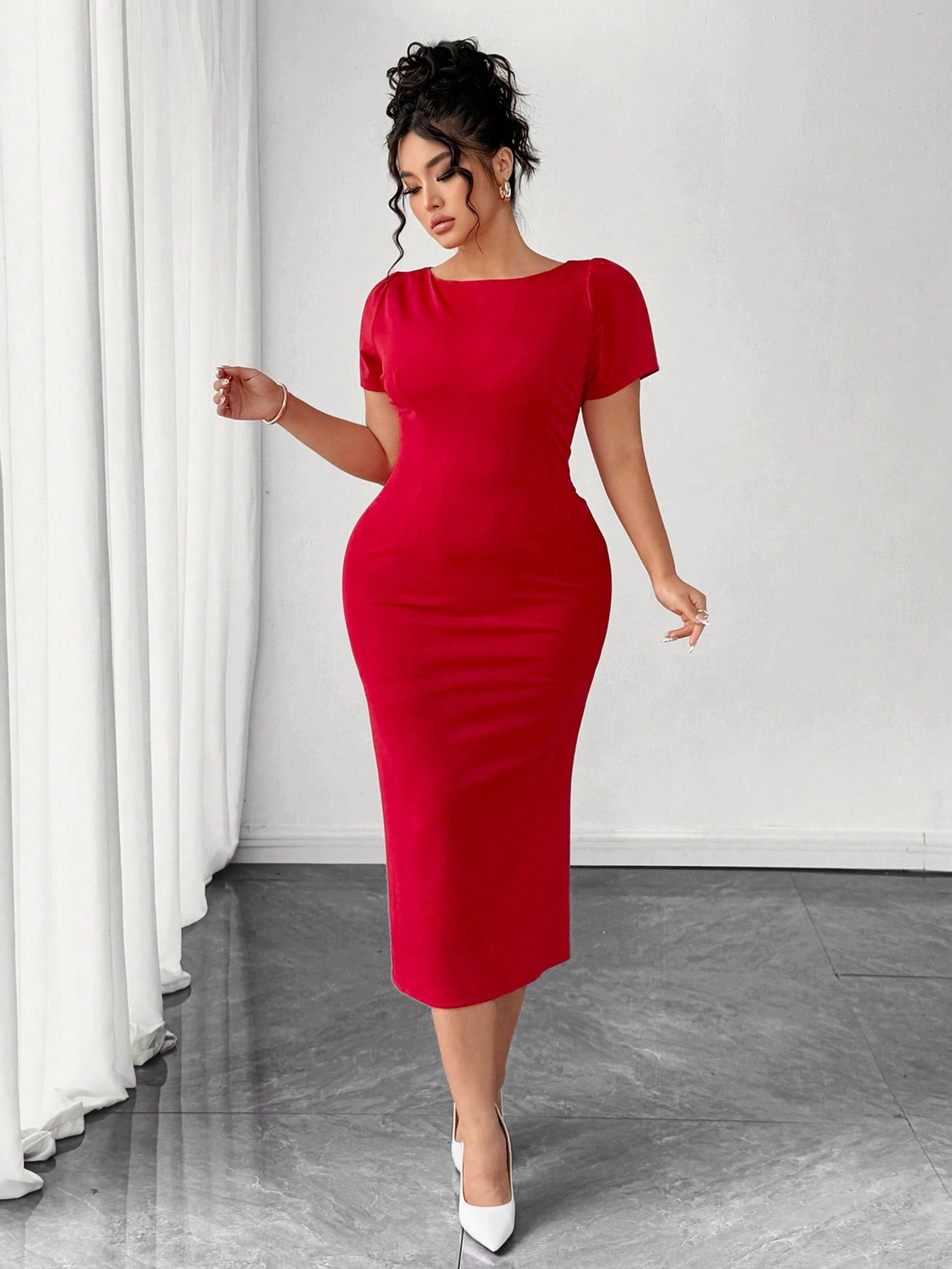 Slip into sophistication with this stunning plus-size bodycon dress that hugs your curves in all the right ways. The pleated hem adds a flirty touch of movement, while the rear button detail brings an unexpected twist of charm. Perfect for date nights, celebrations, or whenever you want to feel absolutely fabulous. This dress proves that elegance comes in every size—because confidence looks best on everyone.