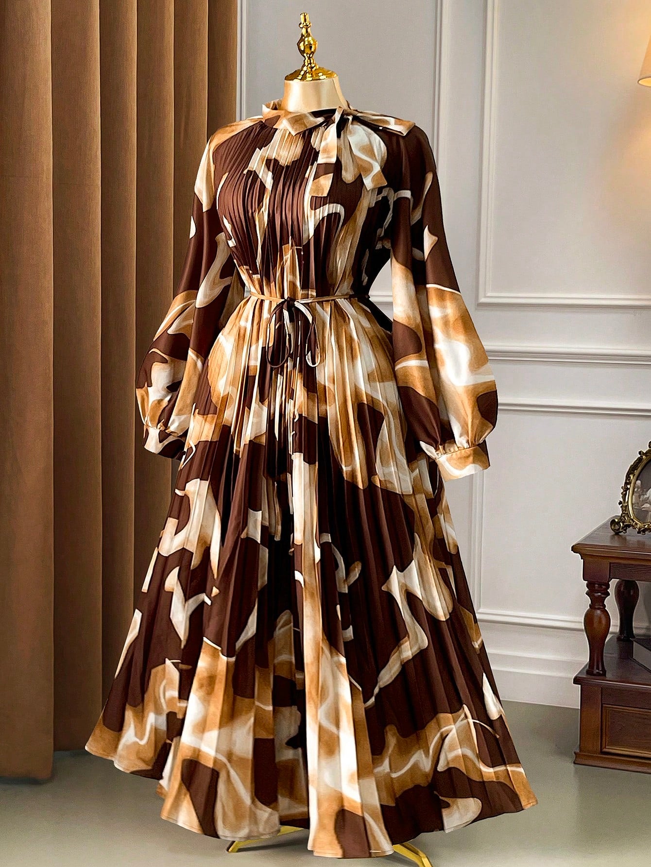 Embrace the season in style with this stunning plus-size midi dress that's equal parts sophisticated and fun! The rich brown base pairs beautifully with multicolor accents, creating a look that's anything but boring. Pleated detailing adds movement and dimension, while the extra-long sleeves provide cozy coverage perfect for crisp fall days. Whether you're heading to brunch or a casual gathering, this dress strikes that sweet spot between elegant and effortlessly chic. Celebrate your curves and your persona