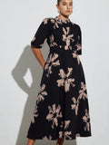 Step out in style with this Elegant Plus Size Brush Print Long Dress. Featuring a high neck and delicate pleated details, it combines comfort with a touch of sophistication. The flowing brush print adds a playful flair, making it perfect for any occasion where you want to feel fabulous and confident.