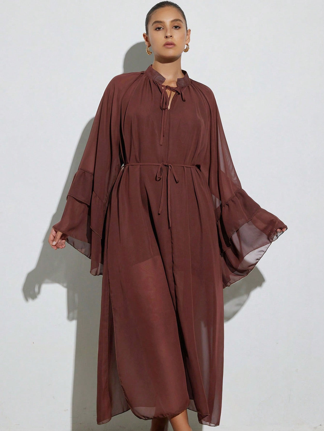 Step into vacation mode with this Elegant Plus Size Chiffon Dress! Featuring a charming tie neck and playful puff sleeves, it combines comfort and style effortlessly. The lightweight chiffon fabric keeps you cool while adding a breezy, feminine touch—ideal for sunny getaways or casual strolls. Embrace your curves and enjoy a flattering fit that moves with you, making every moment feel like a celebration.