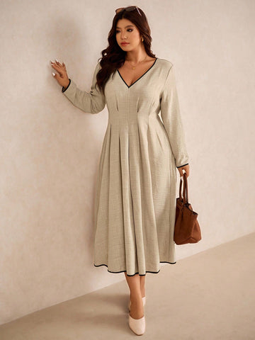 Step up your commuter game with this Elegant Plus Size Color Block Trim Waist Dress. Designed for comfort and style, its flattering color block trim accentuates your waist, giving you a chic silhouette that’s ready for anything—from office meetings to after-hours fun. Embrace effortless confidence and turn heads as you breeze through your day in playful sophistication.