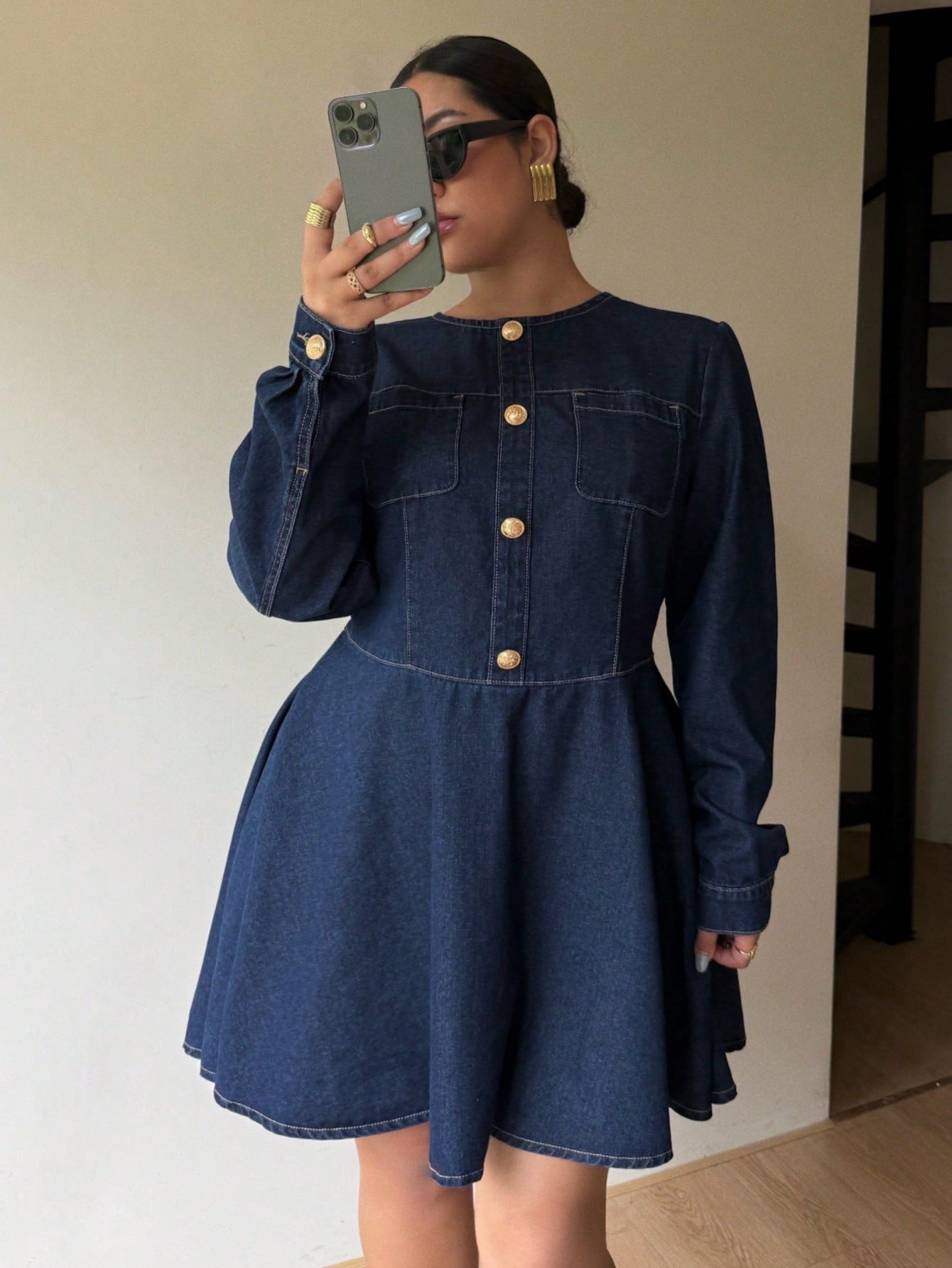 Elevate your holiday wardrobe with this stunning plus-size denim dress that effortlessly blends comfort with sophistication. Featuring a charming awning design, this versatile piece transitions seamlessly from Thanksgiving gatherings to New Year celebrations. The flattering silhouette and quality denim construction make it perfect for autumn and winter festivities, whether you're hosting dinner or dancing the night away. Dress it up with heels and jewelry or keep it casual with sneakers—this wardrobe essent