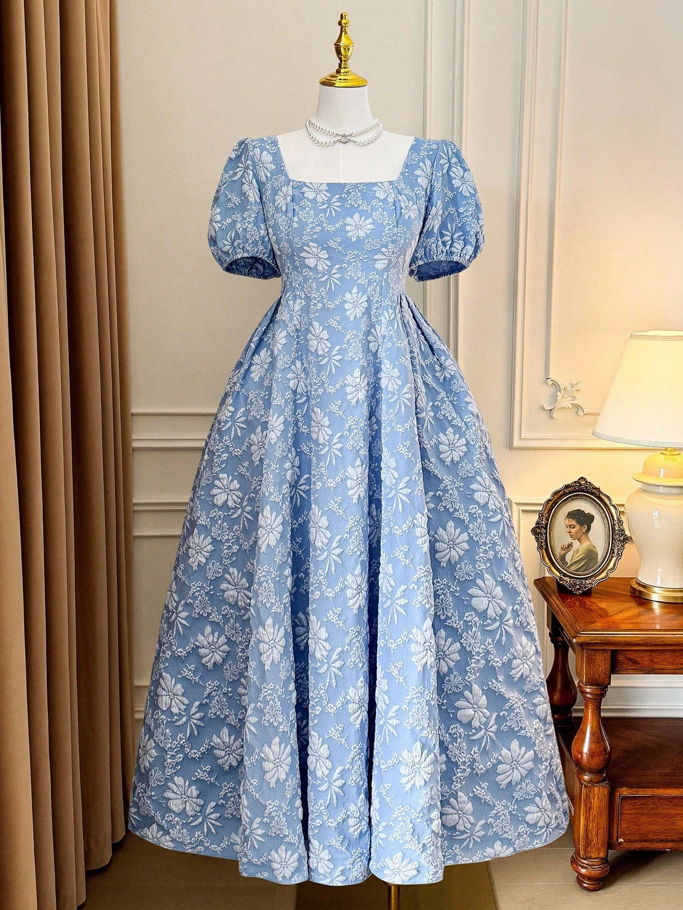 Step into romance with this elegant plus size dress featuring a charming square neckline and playful puff sleeves. Its flared silhouette and textured fabric add a whimsical touch, perfect for twirling through any occasion with confidence and style.