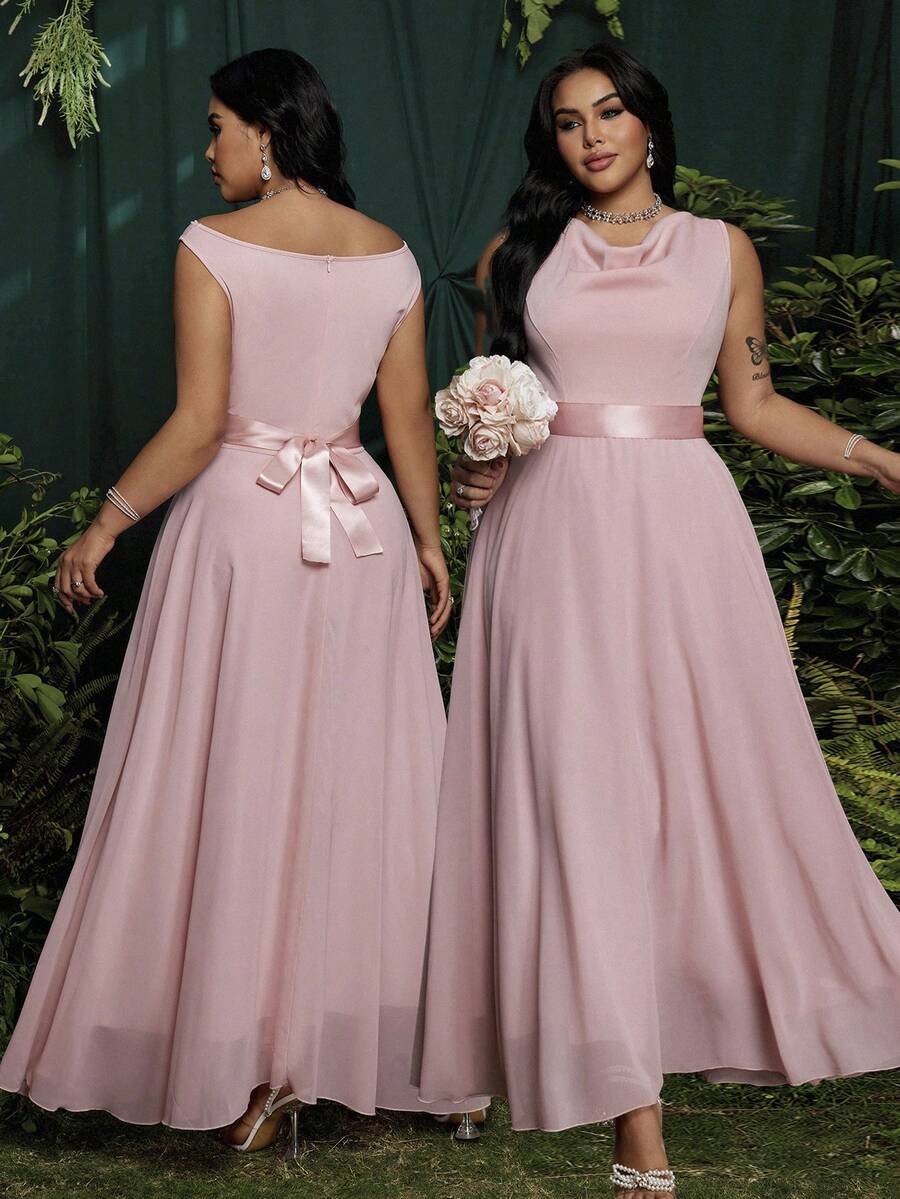 Experience the breathtaking fusion of romantic heritage and sharp, modern architectural tailoring. This stunning dusty pink ensemble is meticulously designed for the woman who values a high-fashion, "quiet luxury" approach to event dressing—the ultimate centerpiece for prestigious bridesmaid duties, exclusive formal galas, and high-authority celebration retreats.