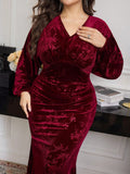Slip into sophistication with this stunning plus-size velvet dress that's ready to turn heads! The luxurious embossed velvet fabric drapes beautifully while the flattering V-neckline and long sleeves offer timeless elegance. Gathered cuffs add a charming detail that catches the light just right. Whether you're heading to a special occasion or elevating your everyday style, this dress celebrates your curves with grace and flair. Comfort meets glamour in every wear!