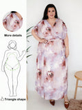 Bloom into confidence with this stunning plus-size floral dress, designed to celebrate your curves with flair! The dreamy batwing sleeves add movement and dimension while gracefully skimming over the midsection—a total game-changer for pear and triangle shapes. Bursting with vibrant florals, this spring and summer essential transitions effortlessly from brunch dates to garden parties. The relaxed silhouette keeps you cool and comfortable while the playful print brings serious personality to your wardrobe. S