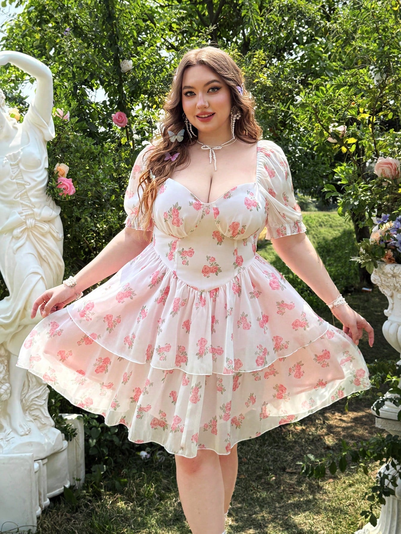 Effortlessly elegant and oh-so-feminine, this plus size floral chiffon dress features a double layered hem for added flow and movement. Perfect for any occasion, it's a must-have for your wardrobe.