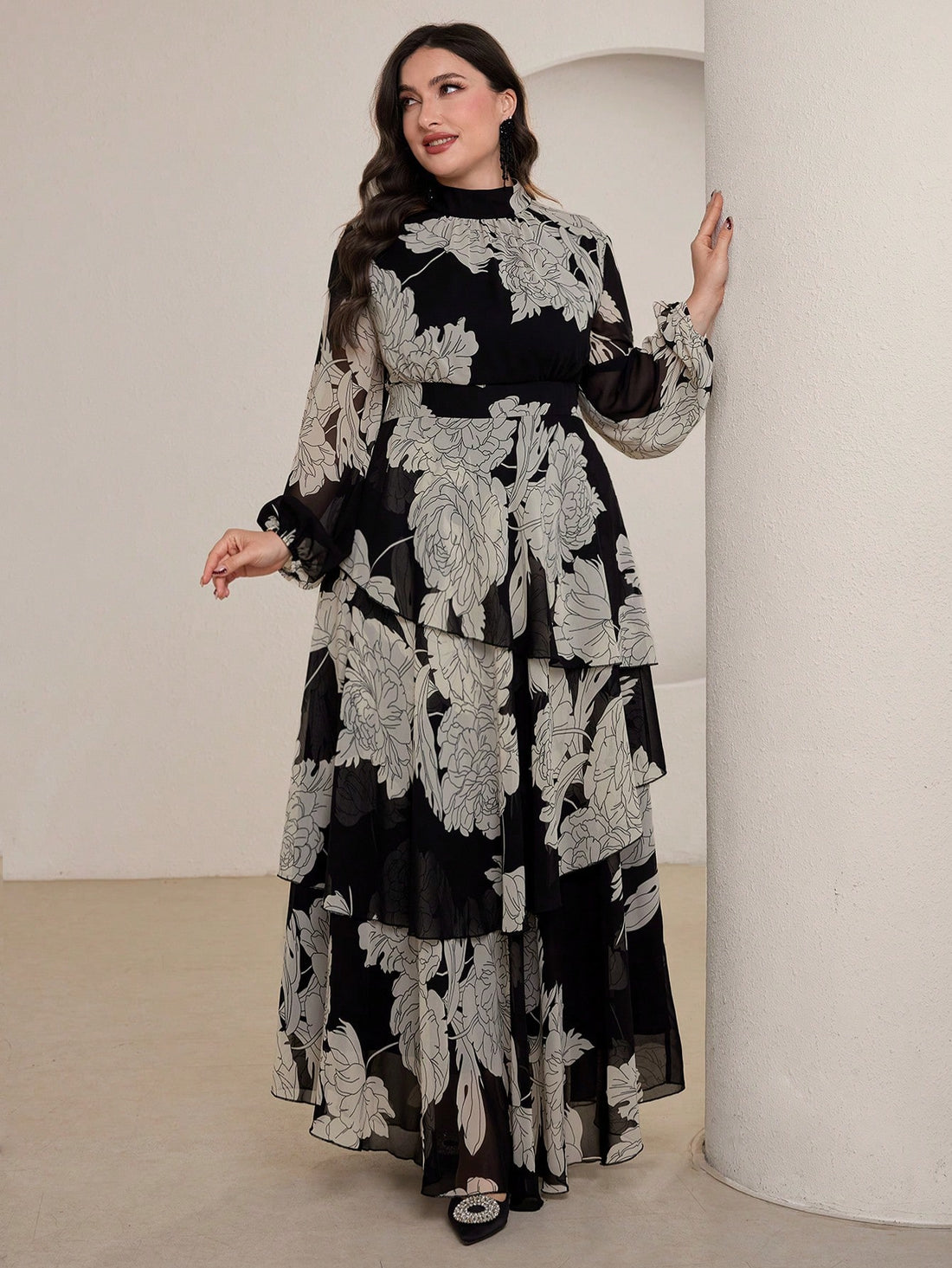 Elevate your fall wardrobe with this stunning floral chiffon dress that celebrates curves with effortless grace. The charming stand collar adds a touch of sophistication, while the cinched waist creates a flattering silhouette that hugs in all the right places. Crafted from lightweight, breathable chiffon, this plus-size beauty features a gorgeous floral print that transitions seamlessly from brunch to evening plans. Perfect for anyone ready to turn heads and feel absolutely fabulous this season!