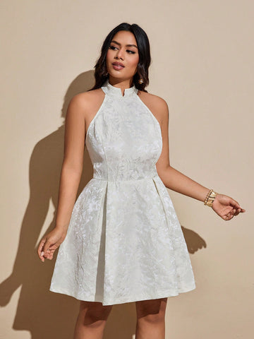 Turn heads with this Elegant Plus Size Floral Jacquard Halter Neck Sleeveless Dress. Its vibrant floral jacquard fabric adds a touch of whimsy, while the halter neck design highlights your shoulders with playful charm. Perfect for any occasion, this dress combines comfort and style effortlessly, making you feel confident and fabulous all day long.
