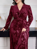 Step into the spotlight in this stunning floral jacquard evening dress that celebrates your curves with effortless grace. The romantic V-neckline flatters while voluminous puff sleeves add a touch of whimsy and dimension. Crafted from luxurious jacquard fabric, this plus-size beauty features an intricate floral pattern that catches every eye in the room. Perfect for galas, weddings, or any occasion where you want to feel absolutely fabulous. Slip it on and let your confidence shine as bright as you do.