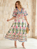 Shop elegant plus size floral Two-Piece Outfits with a V-neck blouse and loose skirt. A feminine, versatile set for summer, vacations, brunch, and parties.
