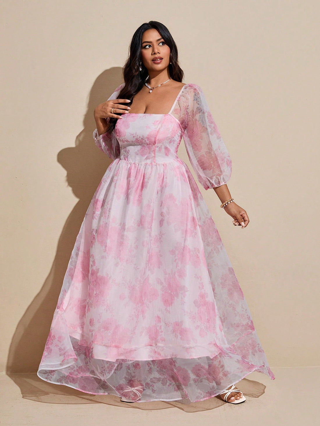 Step into charm and comfort with this Elegant Plus Size Floral Print Dress. Featuring whimsical lantern sleeves and a flattering square neckline, it brings a fresh twist to floral fashion. Perfect for twirling through sunny days or making a statement at your next gathering, this dress combines playful style with a comfortable fit designed just for you. Embrace your curves and bloom beautifully wherever you go!