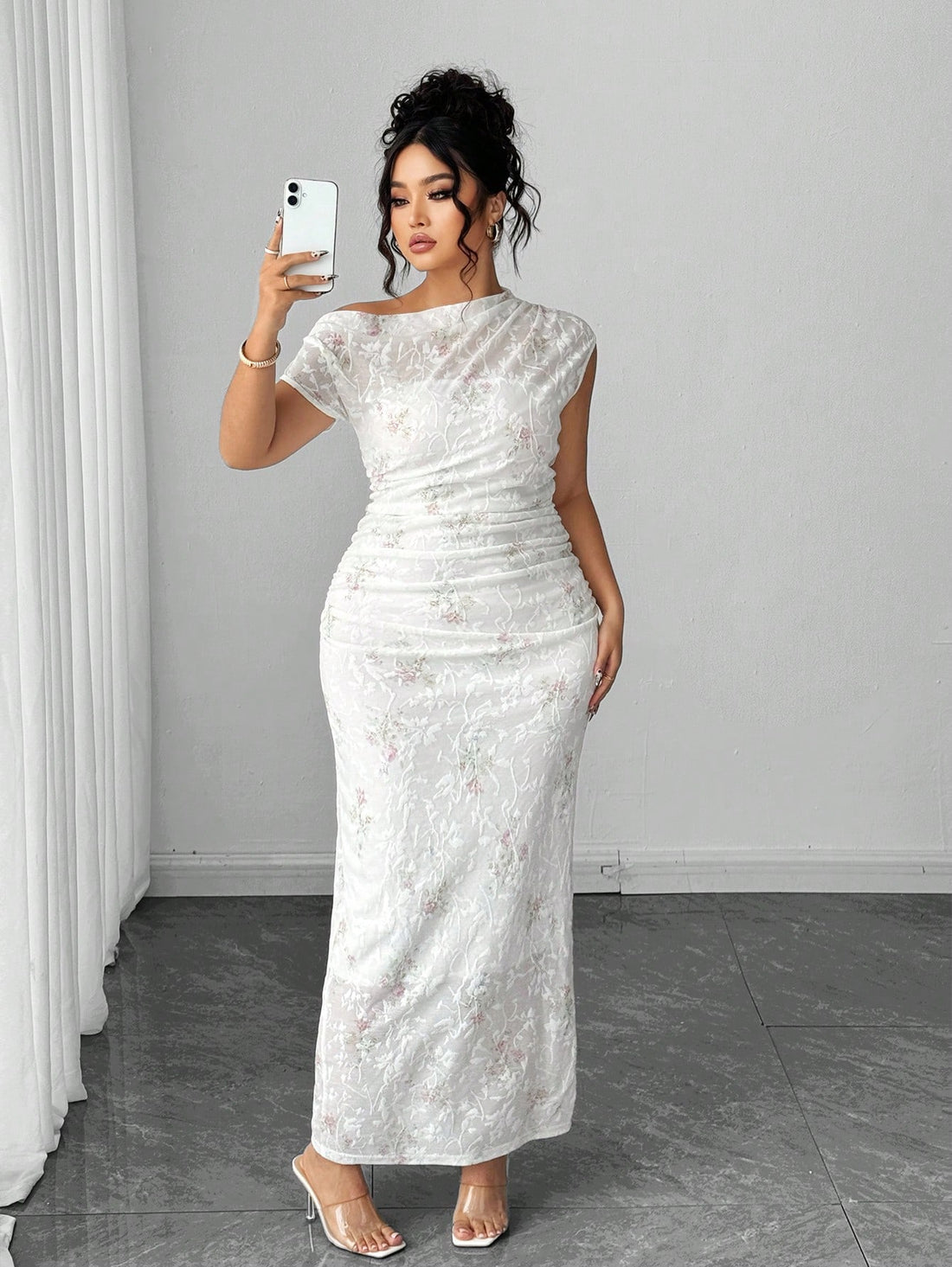 Turn heads with this Elegant Plus Size Floral Sheer One-Shoulder Bodycon Dress! Its delicate sheer fabric and charming floral design add a flirty touch, while the one-shoulder cut highlights your neckline with playful sophistication. Designed to hug your curves comfortably, this dress is perfect for making a confident, stylish statement at any event. Embrace your beauty and let your personality bloom!