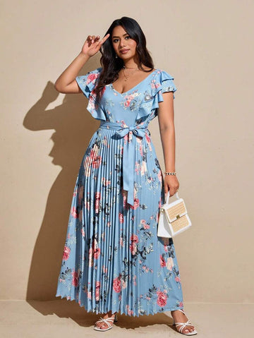 Step into sunshine with this Elegant Plus Size Floral V-Neck Ruffled A-Line Dress! Its playful ruffles and flattering A-line cut bring breezy comfort and style to your summer vacation wardrobe. The vibrant floral pattern and feminine V-neck add a touch of charm, making it perfect for sunny strolls or beachside dinners. Embrace effortless elegance and feel fabulous wherever your adventures take you!