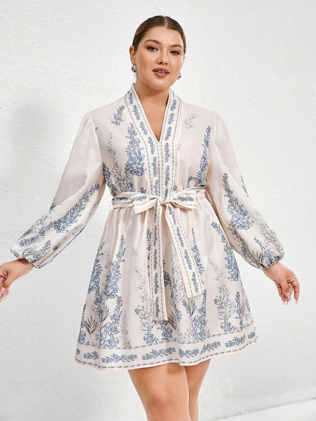 Step into vacation mode with this Elegant Plus Size Floral Wrap Dress! Featuring a flattering V-neck and a cinched waist, it effortlessly highlights your curves while keeping comfort front and center. The vibrant floral pattern adds a playful touch, perfect for sunny days and breezy evenings. Whether you're strolling the boardwalk or enjoying a seaside dinner, this dress brings easy elegance to your getaway wardrobe.